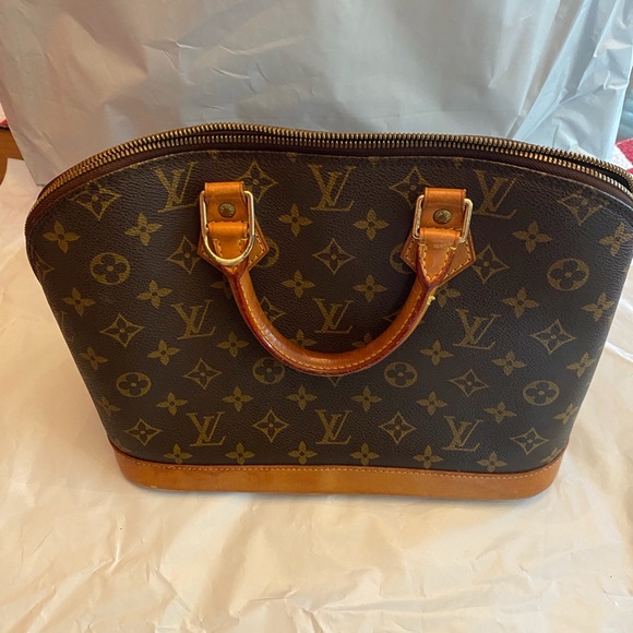 LOUIS. VUITTON MONOGRAMMED ALMA HANDBAG - Picture 4 of 16